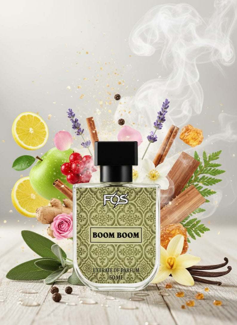 Perfume bottle labeled 'BOOM BOOM' surrounded by floral and fruit elements on a light background